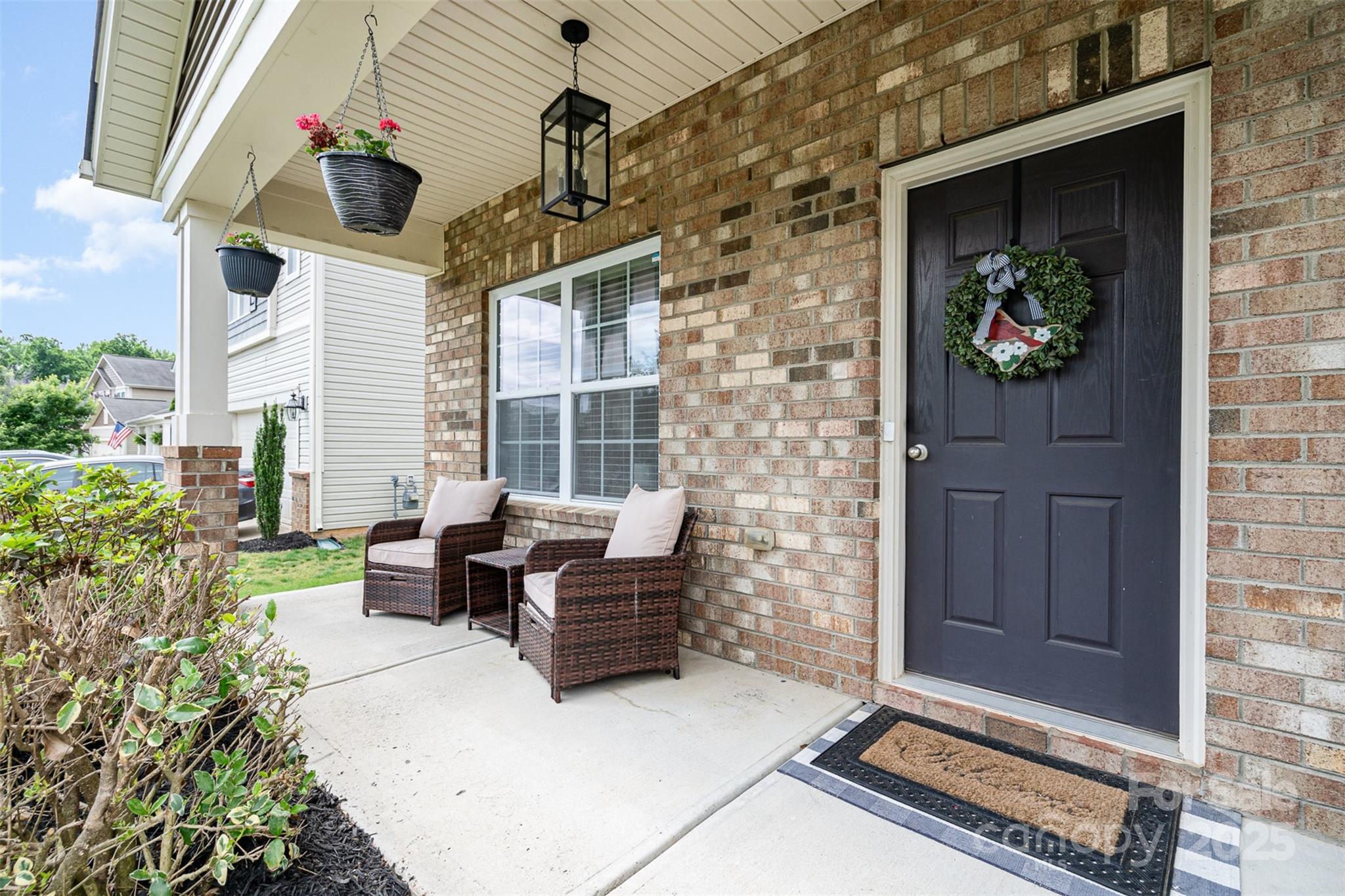1244 Tranquil Falls Lane Matthews, NC 28104 - Photo 5 of 40 a view of living room filled with furniture and a potted plant