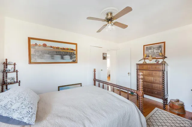 a bathroom with a sink a toilet and a window