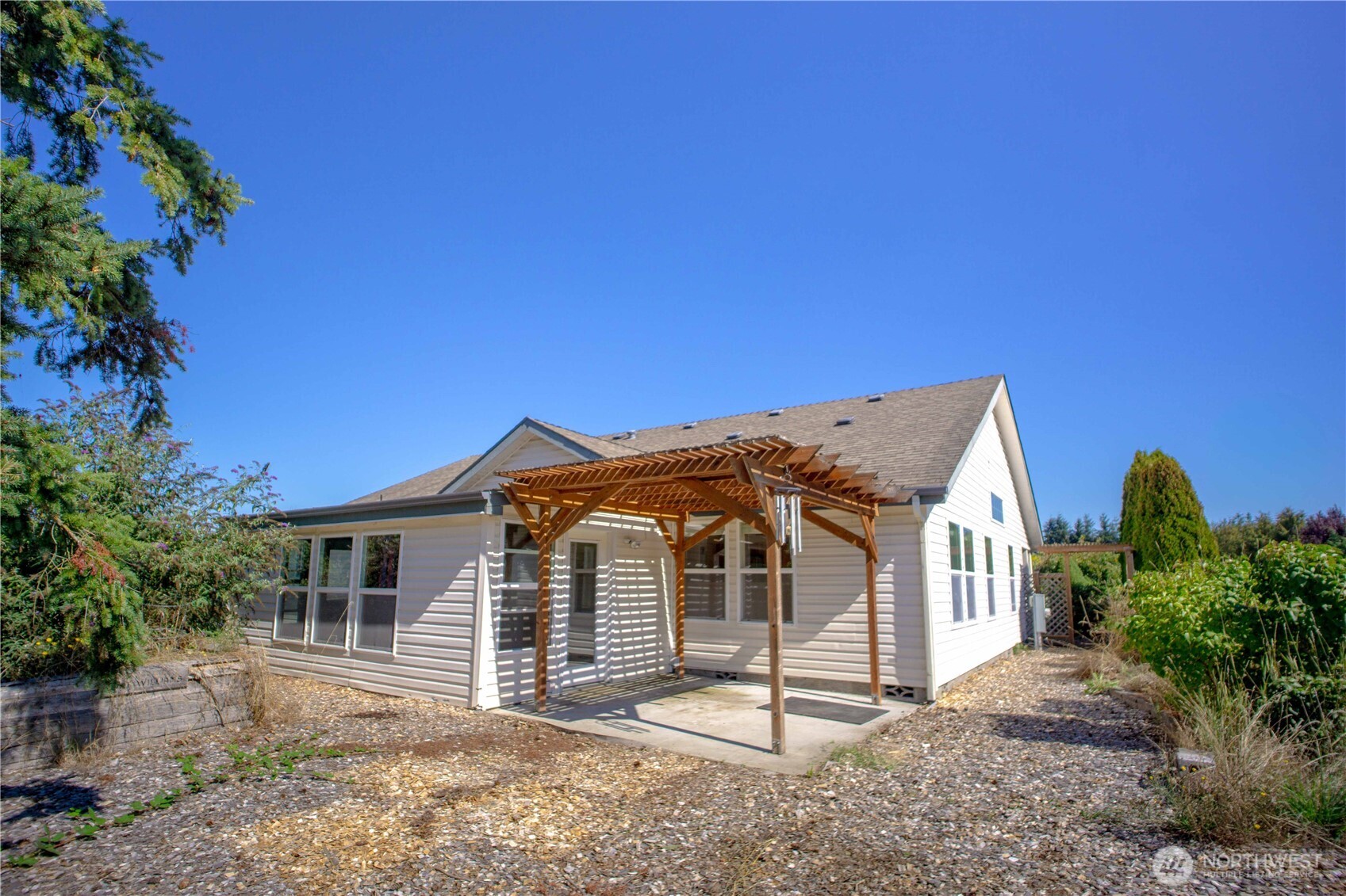 660 Elk Loop Sequim, WA 98382 - Photo 26 of 36 a view of a house with a yard
