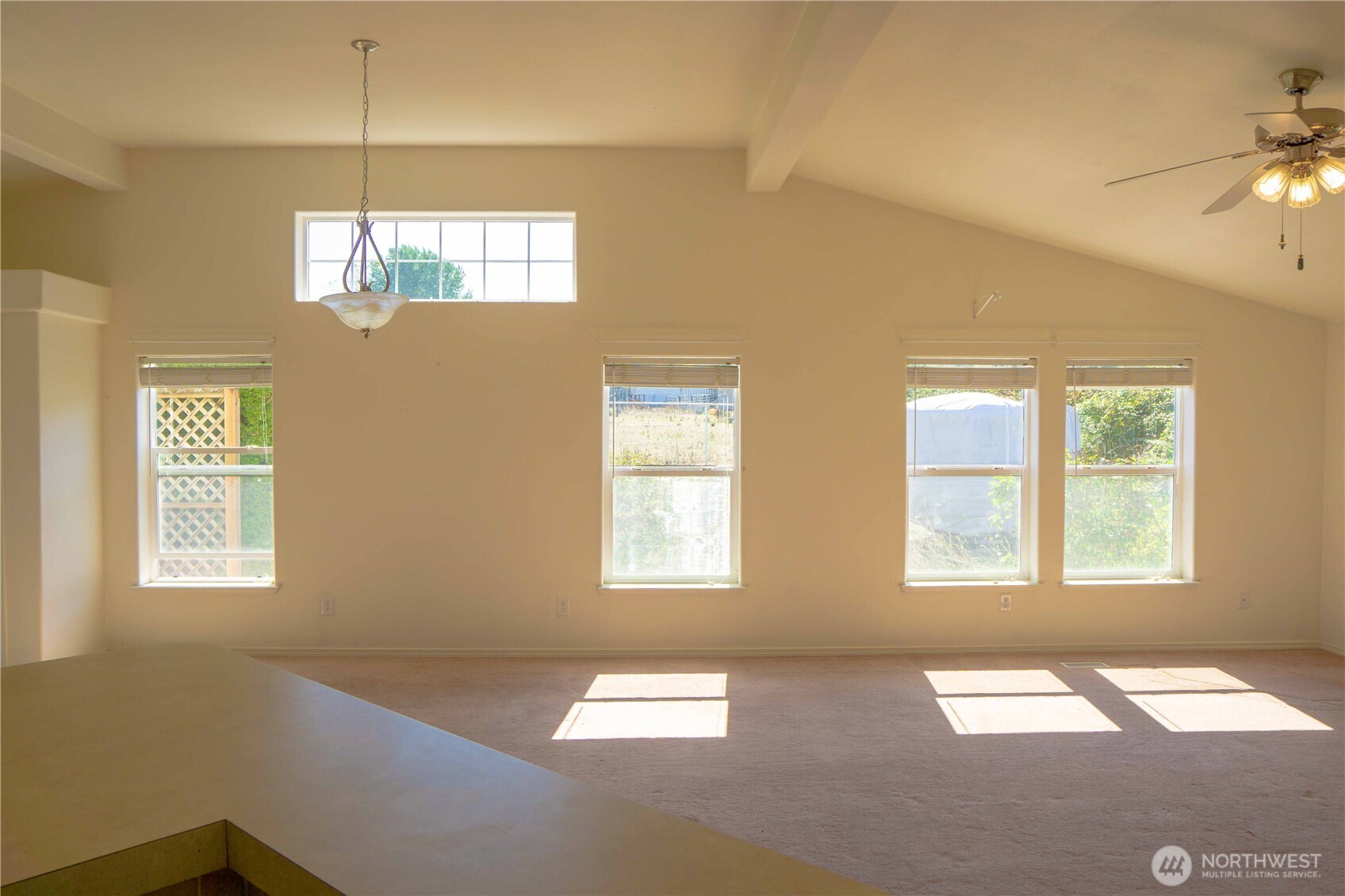 660 Elk Loop Sequim, WA 98382 - Photo 4 of 36 a view of an empty room with a window