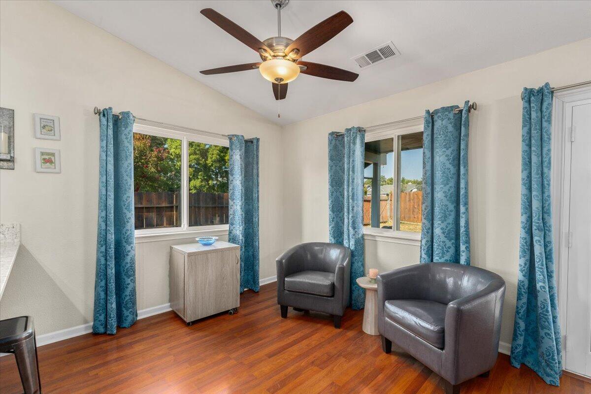 1543 Marigold Way Redding, CA 96003 - Photo 11 of 47 a living room with furniture and a window