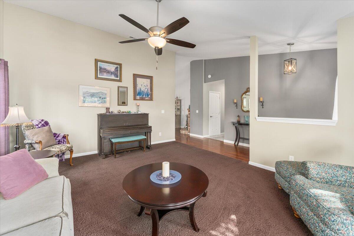 1543 Marigold Way Redding, CA 96003 - Photo 23 of 47 a living room with furniture and a table