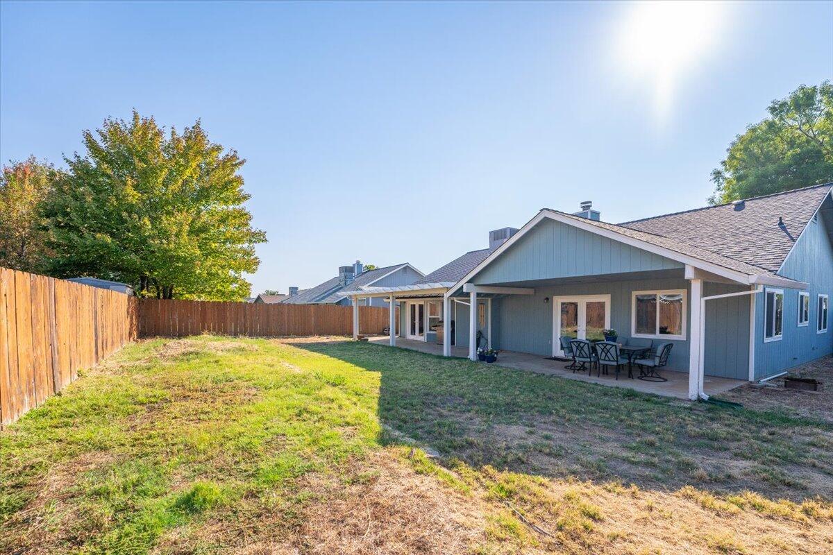 1543 Marigold Way Redding, CA 96003 - Photo 32 of 47 front view of a house with a yard