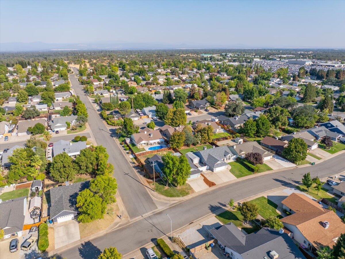 1543 Marigold Way Redding, CA 96003 - Photo 43 of 47 an aerial view of residential houses with outdoor space