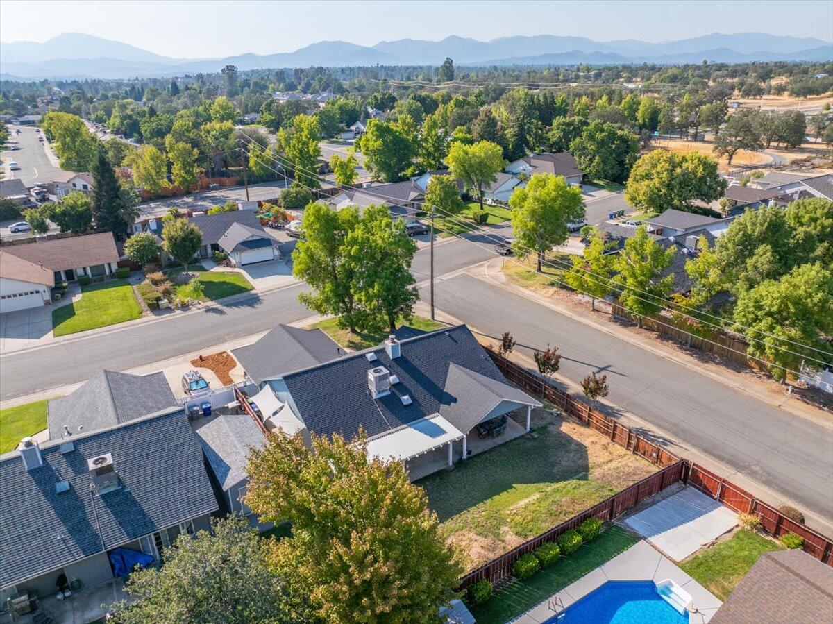 1543 Marigold Way Redding, CA 96003 - Photo 45 of 47 an aerial view of a house with a garden