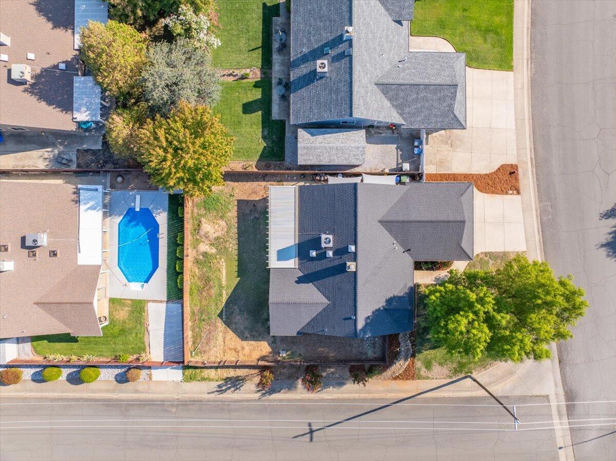 1543 Marigold Way Redding, CA 96003 - Photo 46 of 47 an aerial view of houses with outdoor space