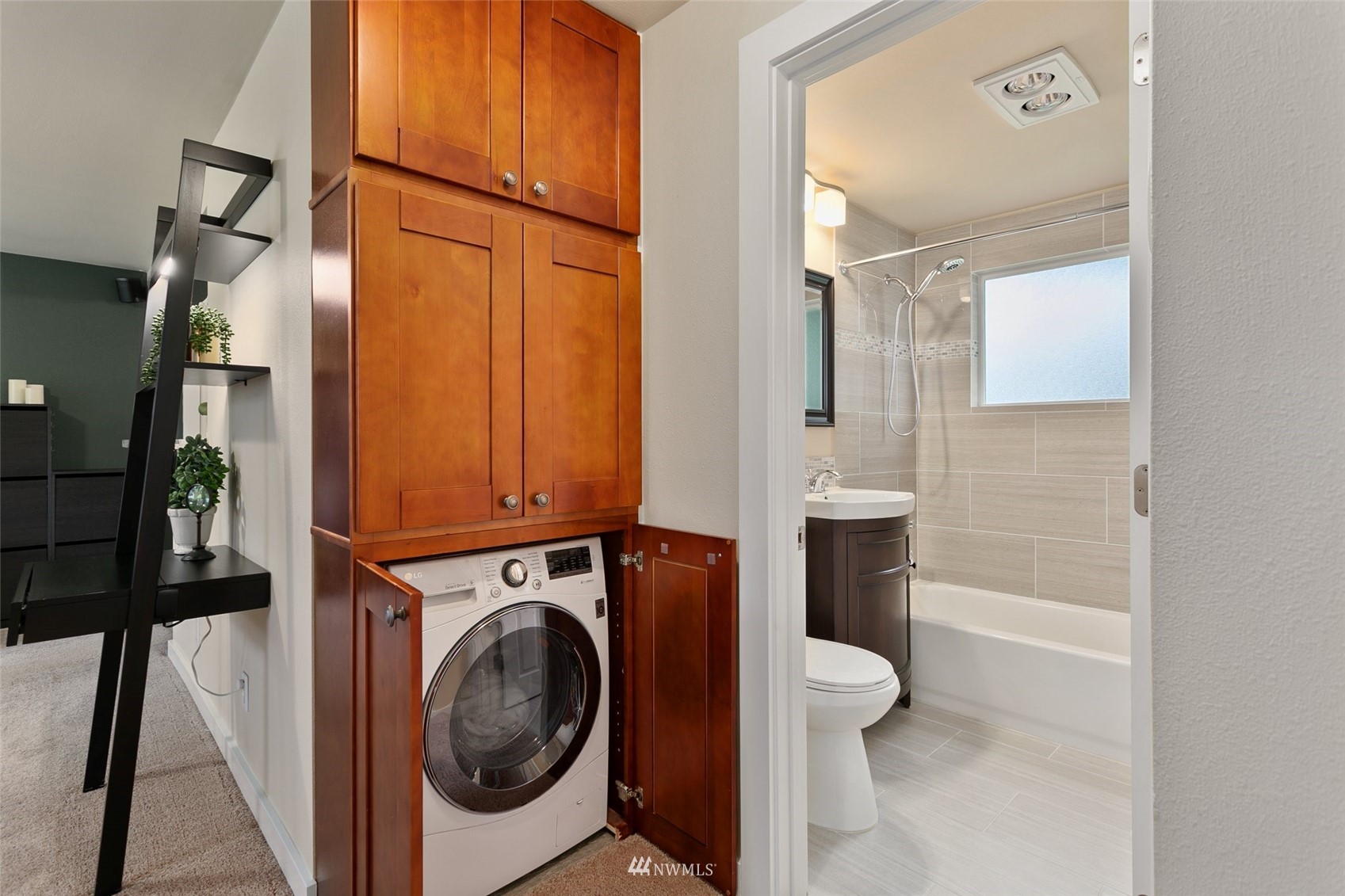 3523 Northeast 6th Street Renton, WA 98056 - Photo 12 of 27 a bathroom with a toilet and a shower