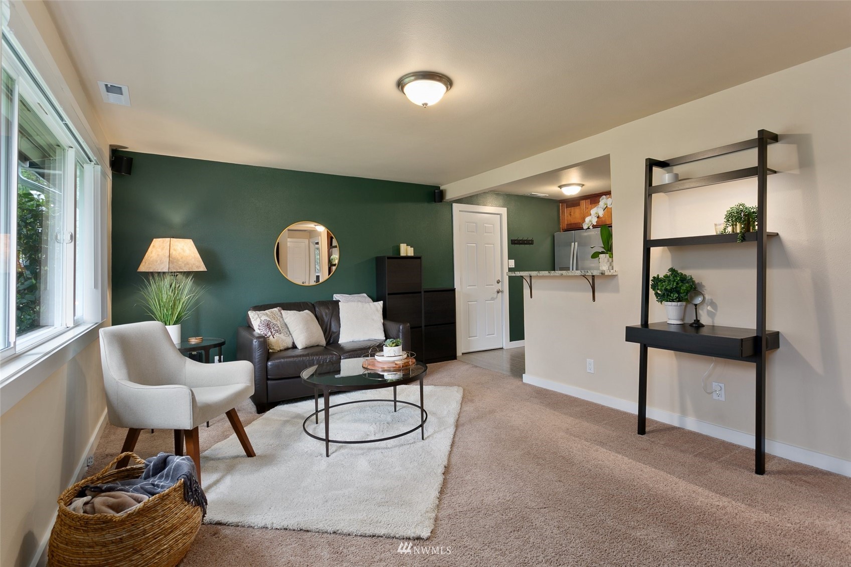 3523 Northeast 6th Street Renton, WA 98056 - Photo 3 of 27 a living room with furniture and a wooden floor