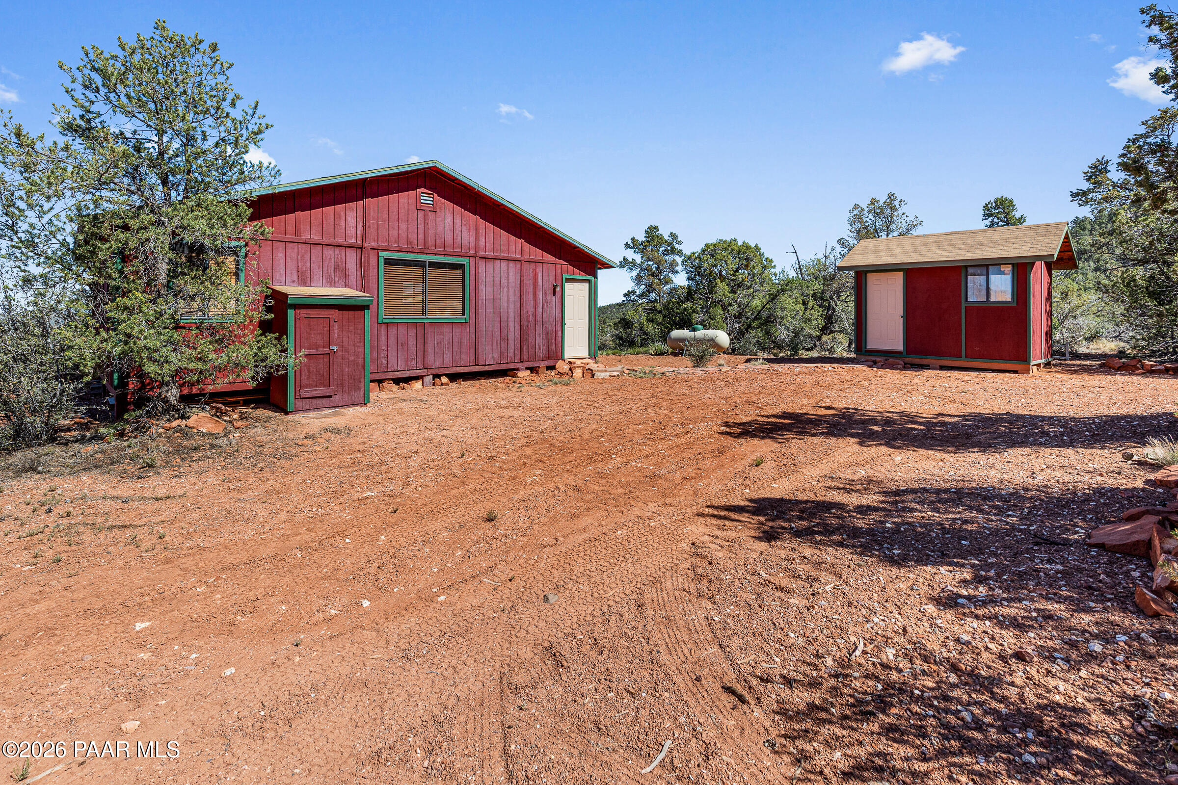 33749 West Whiskey River Road, Unit 21 Seligman, AZ 86337 - Photo 6 of 41 a view of a house with a yard