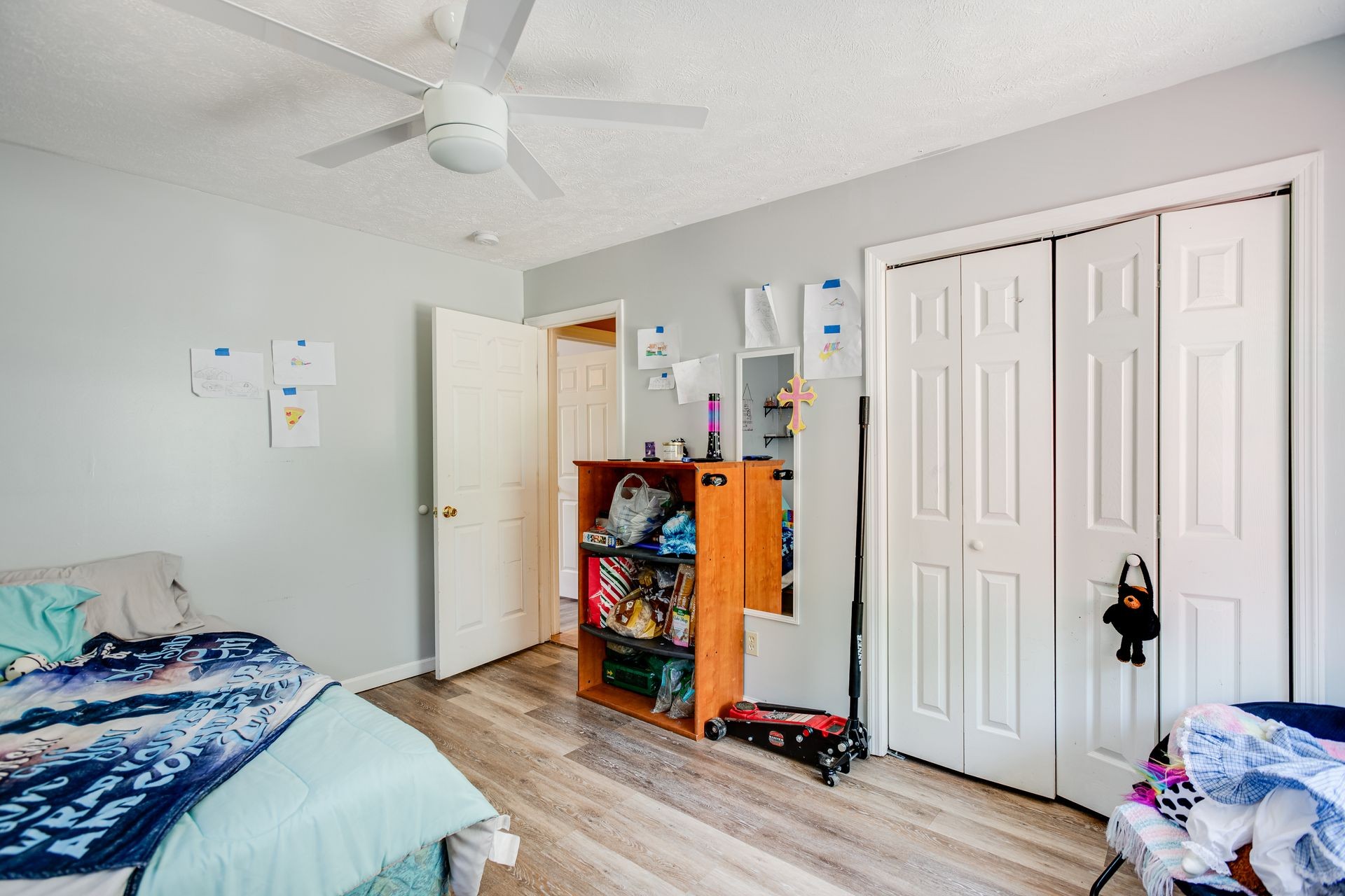 247 Lambs Ferry Road Loretto, TN 38469 - Photo 18 of 25 a bed room with a bed and a window
