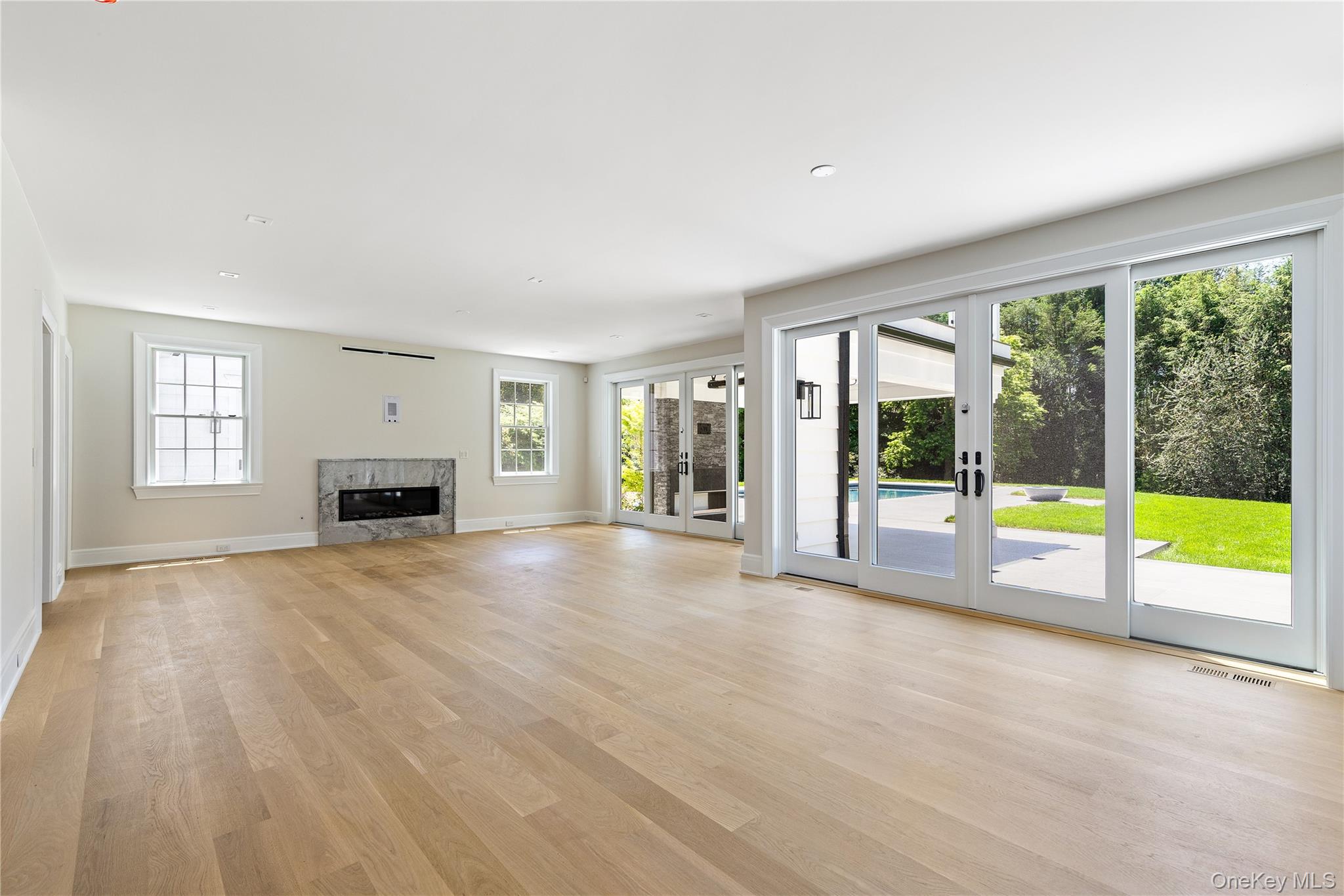 42 Mamaroneck Road Scarsdale, NY 10583 - Photo 16 of 47 The open-concept layout creates bright, airy gathering spaces that are equally suited to everyday living and large-scale entertaining.