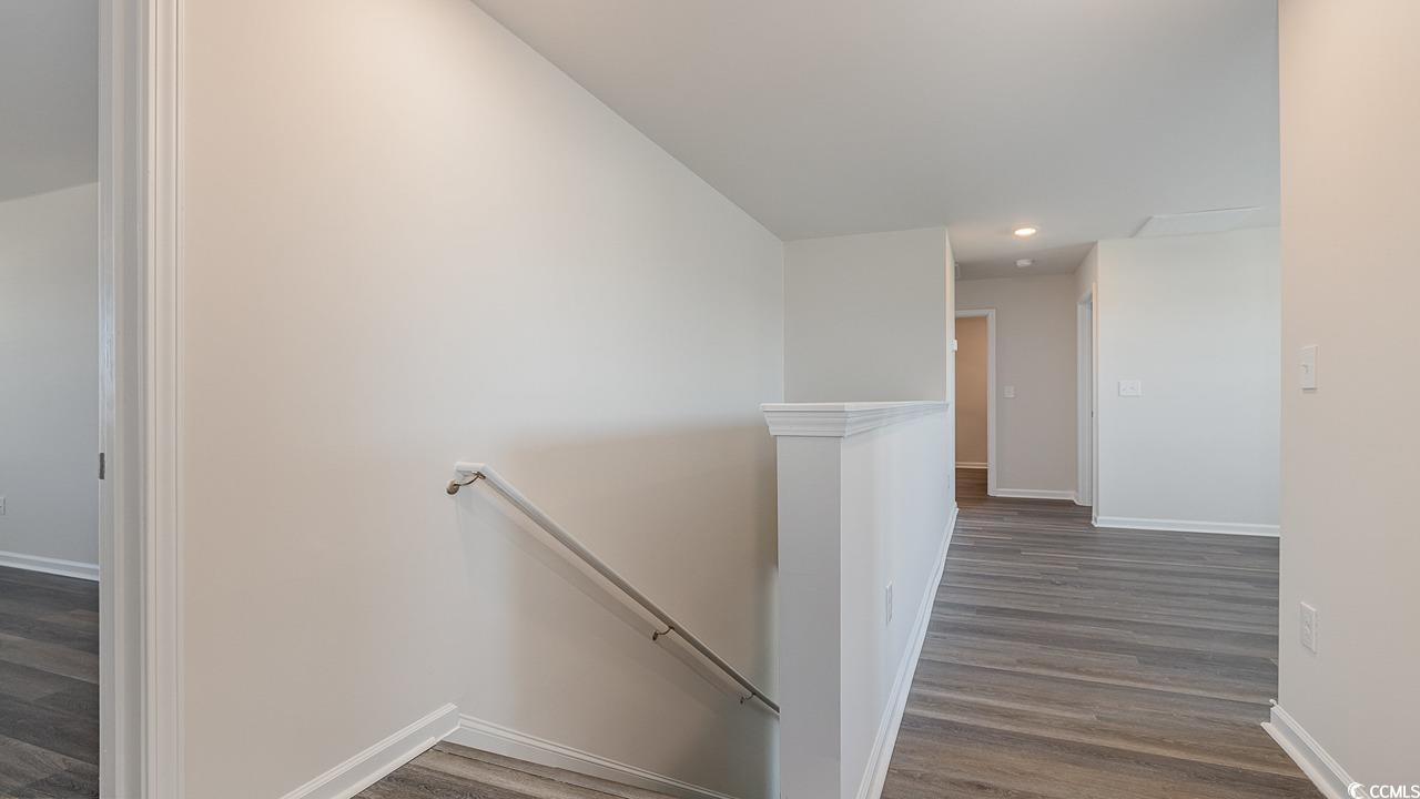 6054 Fuller Rdg Court Conway, SC 29526 - Photo 17 of 31 Corridor featuring dark hardwood / wood-style floo