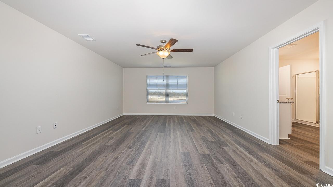 6054 Fuller Rdg Court Conway, SC 29526 - Photo 19 of 31 Unfurnished room featuring ceiling fan and dark ha