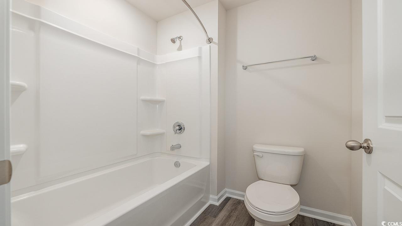 6054 Fuller Rdg Court Conway, SC 29526 - Photo 28 of 31 Bathroom with shower / washtub combination, hardwo