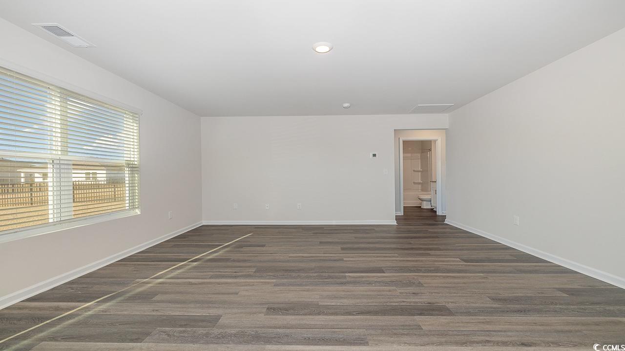 6054 Fuller Rdg Court Conway, SC 29526 - Photo 31 of 31 Spare room with dark hardwood / wood-style floors