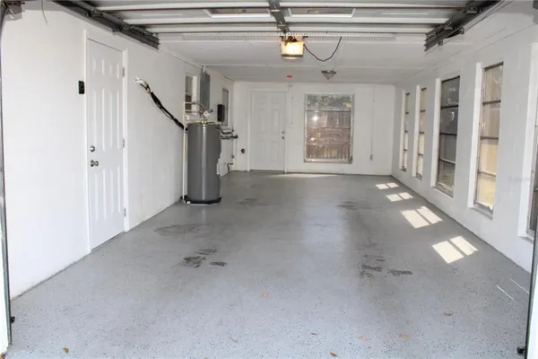 a view of a hallway with staircase