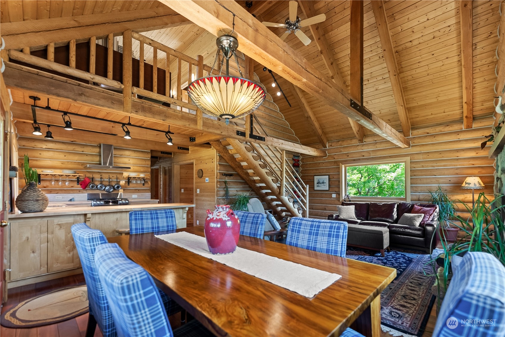 16 Lewisia Road Winthrop, WA 98862 - Photo 12 of 40 a view of a dining room with furniture window and outside view