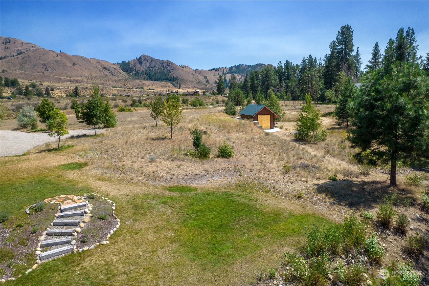 16 Lewisia Road Winthrop, WA 98862 - Photo 22 of 40 a view of a lake with mountain