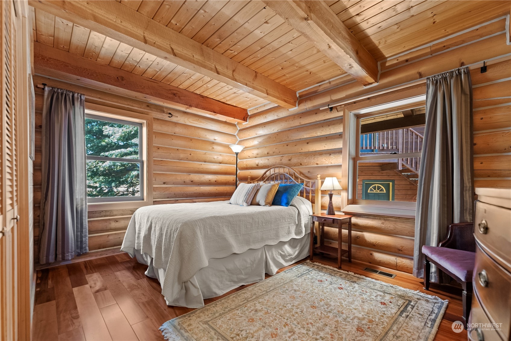 16 Lewisia Road Winthrop, WA 98862 - Photo 24 of 40 a bedroom with a bed and a window