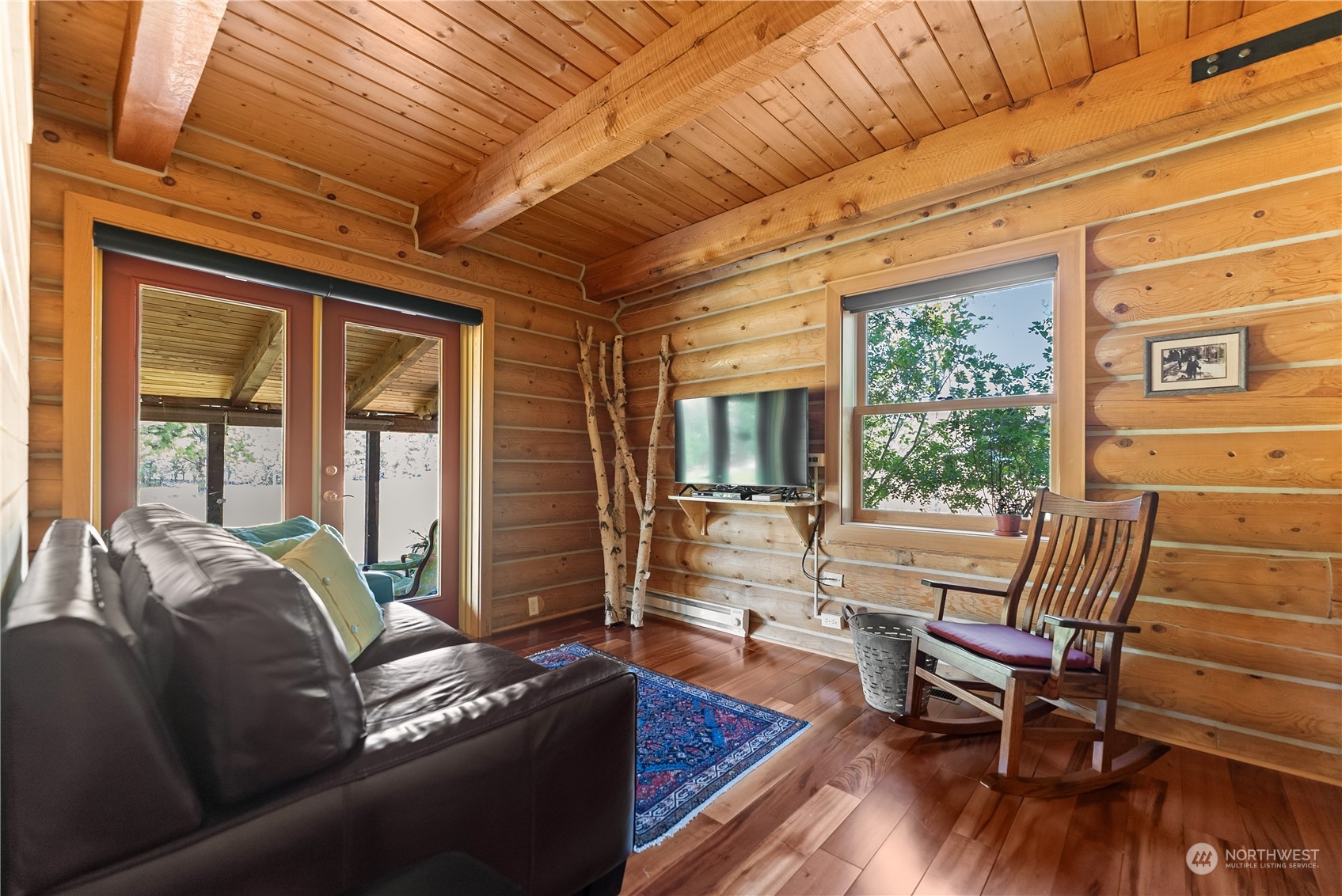 16 Lewisia Road Winthrop, WA 98862 - Photo 25 of 40 a living room with furniture and wooden floor