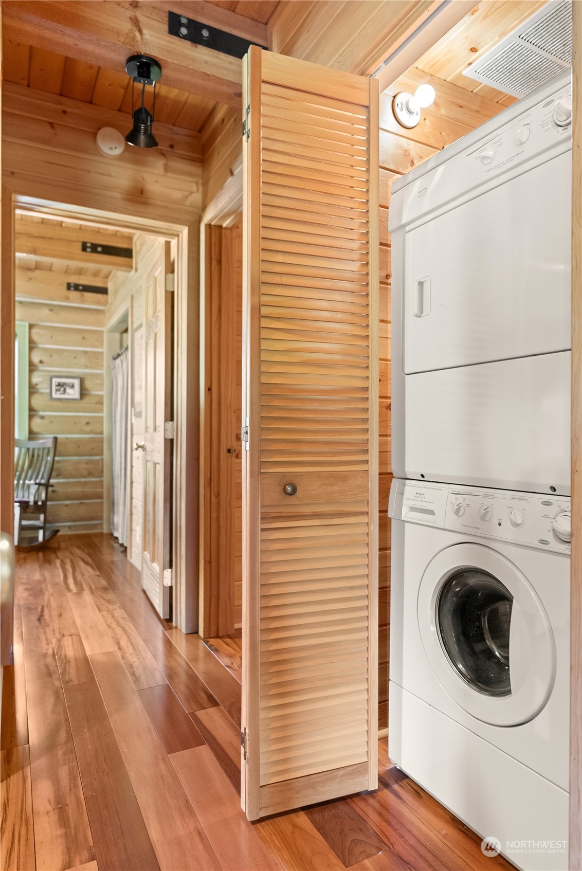 16 Lewisia Road Winthrop, WA 98862 - Photo 27 of 40 a view of a hallway with washer and dryer