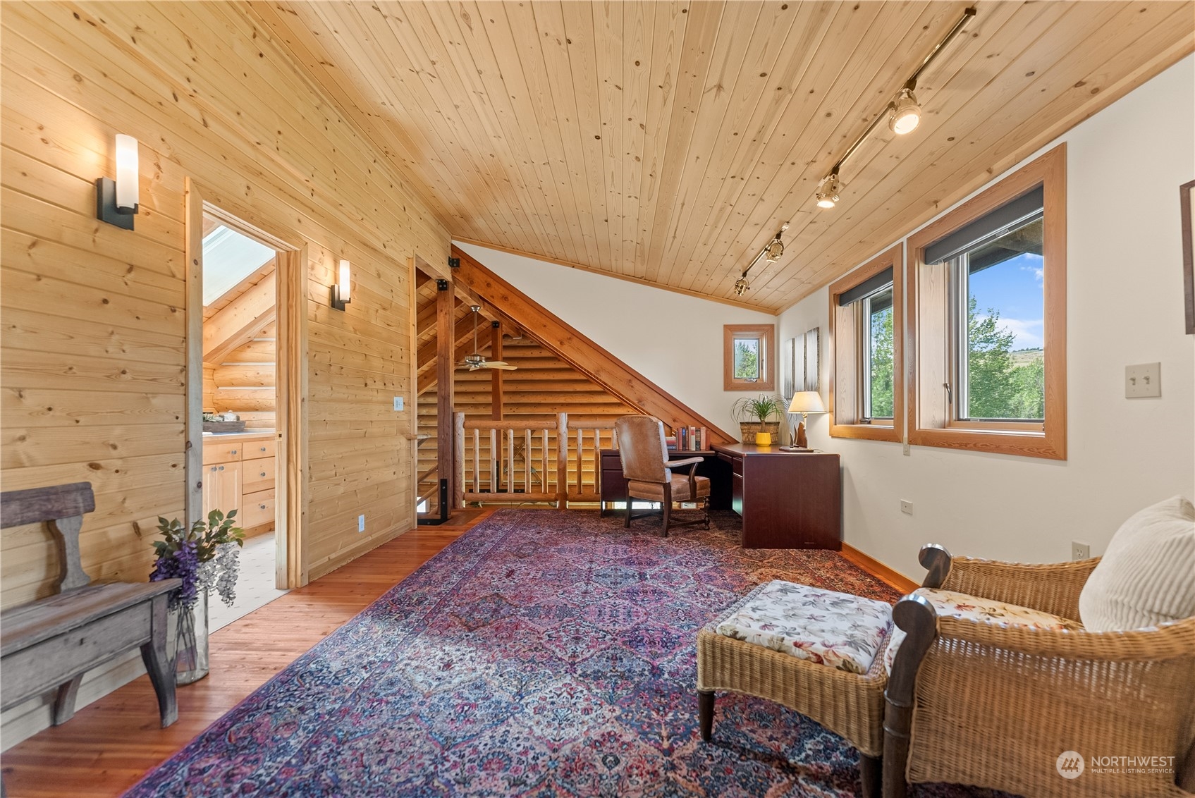 16 Lewisia Road Winthrop, WA 98862 - Photo 30 of 40 a living room with furniture and a window