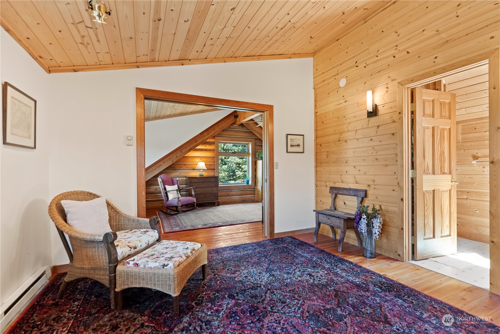 16 Lewisia Road Winthrop, WA 98862 - Photo 31 of 40 a living room with furniture and a wooden floor