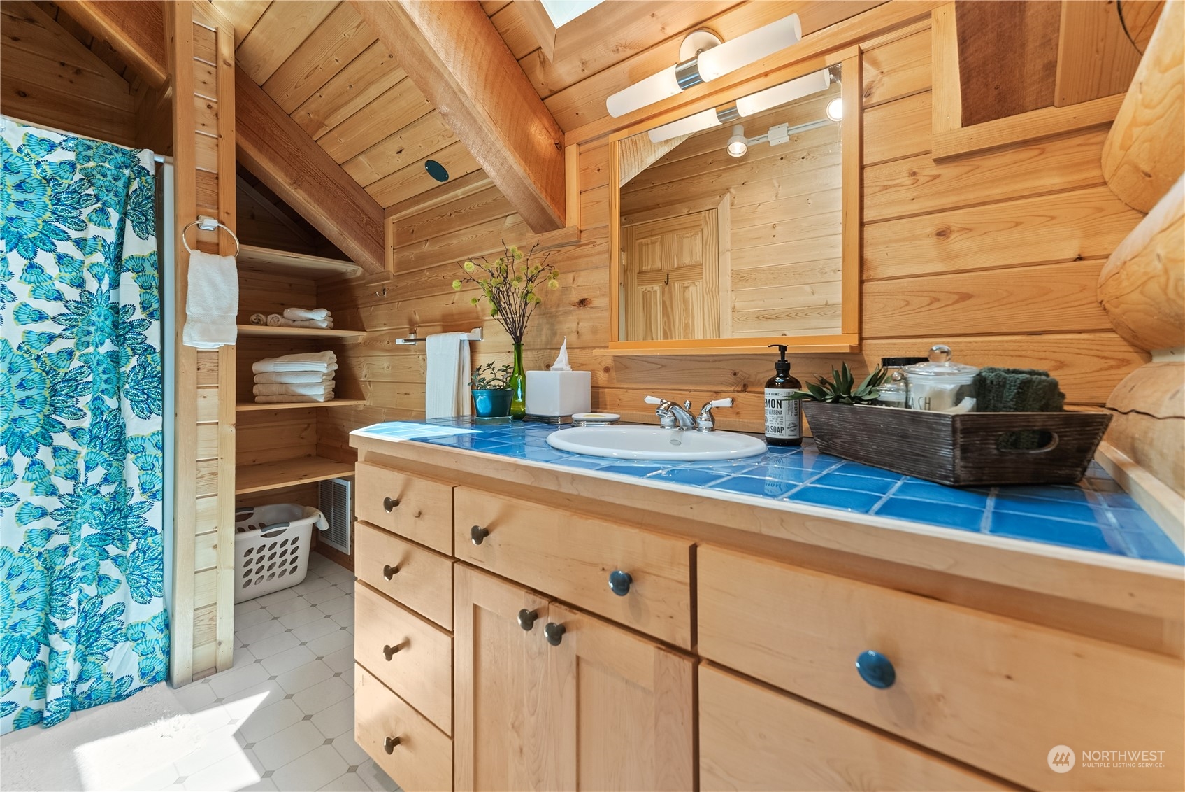 16 Lewisia Road Winthrop, WA 98862 - Photo 33 of 40 a kitchen with stainless steel appliances kitchen island granite countertop a refrigerator and a stove
