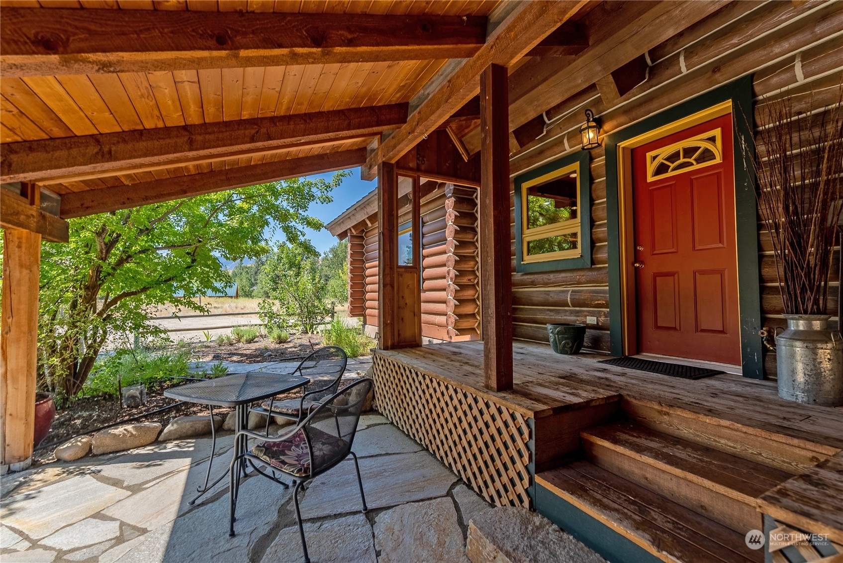 16 Lewisia Road Winthrop, WA 98862 - Photo 37 of 40 a view of porch with a bench