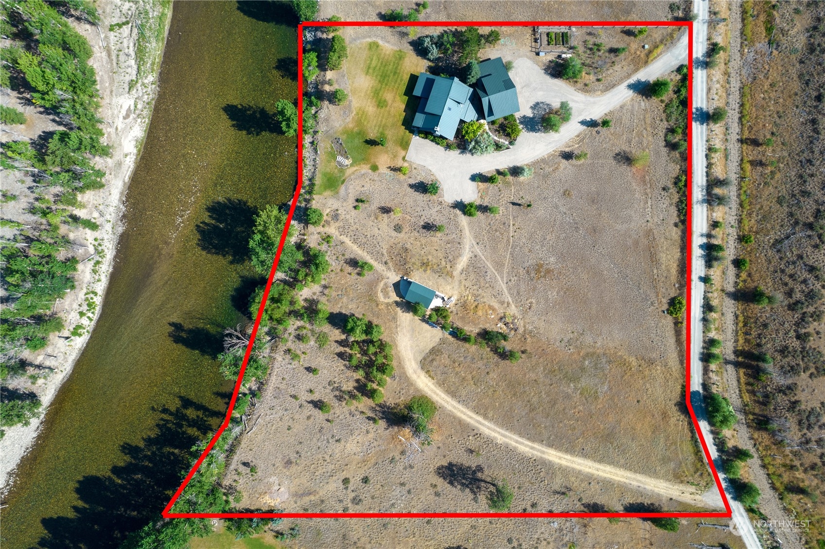 16 Lewisia Road Winthrop, WA 98862 - Photo 5 of 40 an aerial view of a house