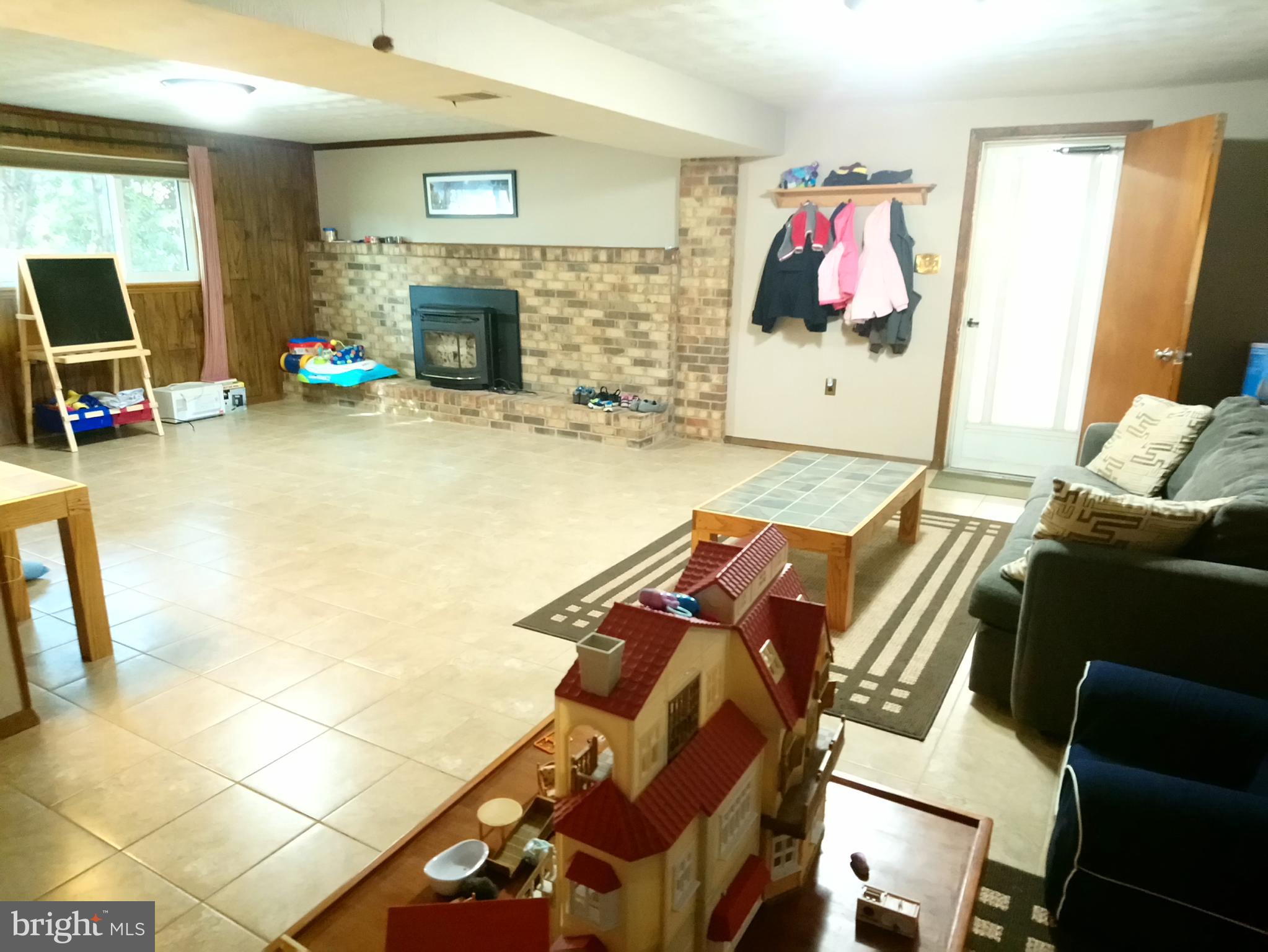 4520 Stratford Road Pomfret, MD 20675 - Photo 34 of 56 BIG Family room 24' x 15' 7" on lower level