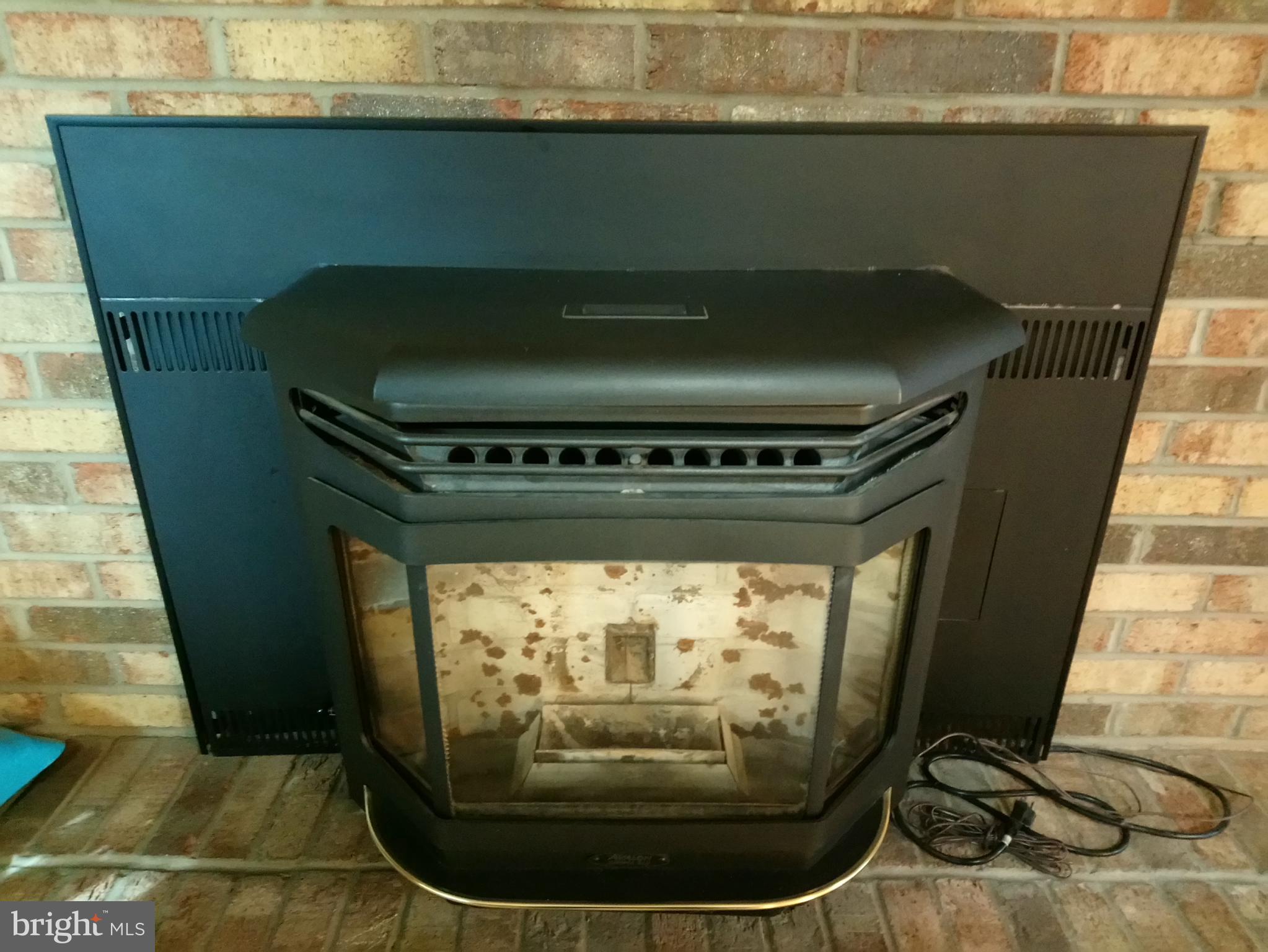 4520 Stratford Road Pomfret, MD 20675 - Photo 35 of 56 Pellet stove in family room