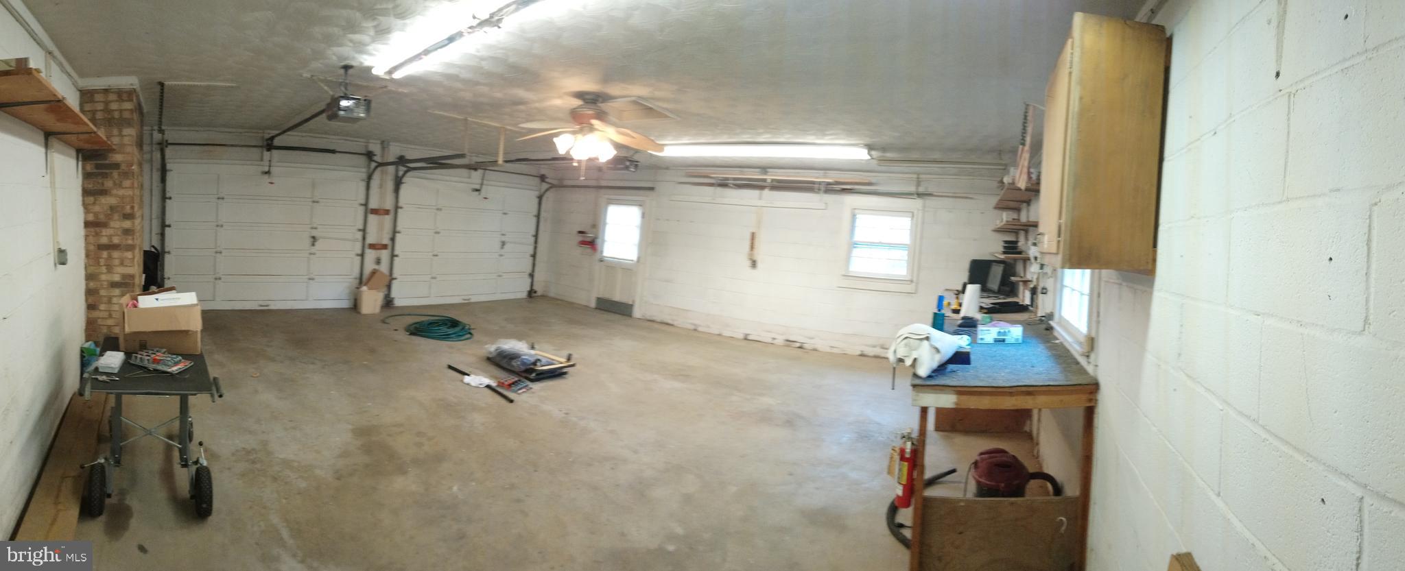 4520 Stratford Road Pomfret, MD 20675 - Photo 43 of 56 Spacious 2 car garage w/ workshop 23' 3" x 24' 6"