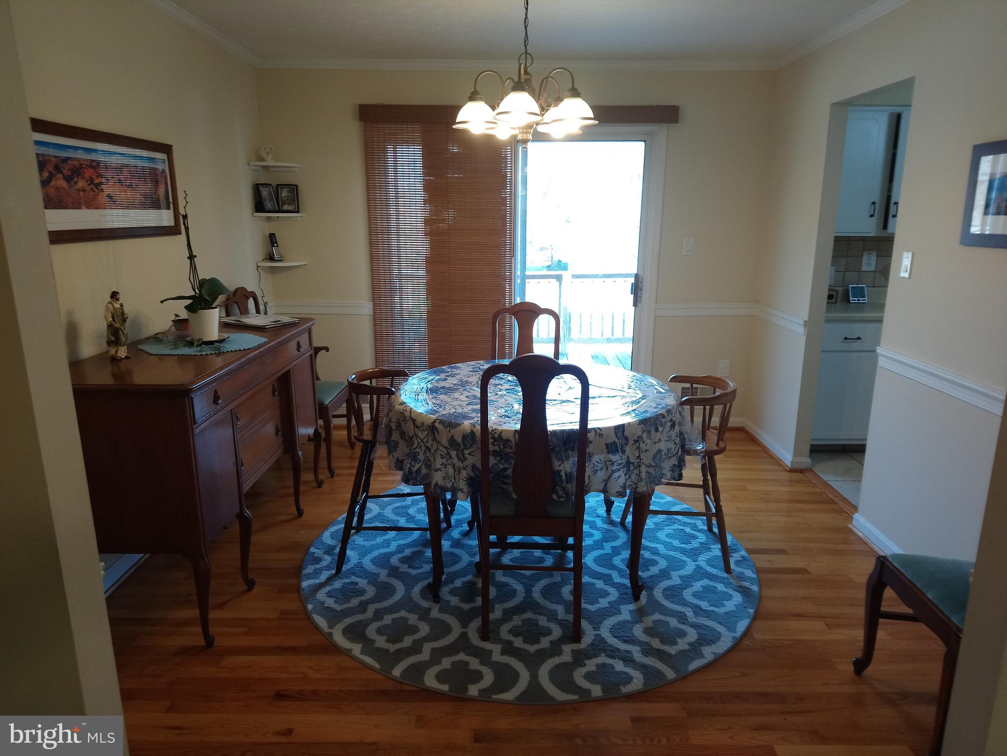 4520 Stratford Road Pomfret, MD 20675 - Photo 10 of 56 Dining room 12' x 10' 11" leading to rear deck