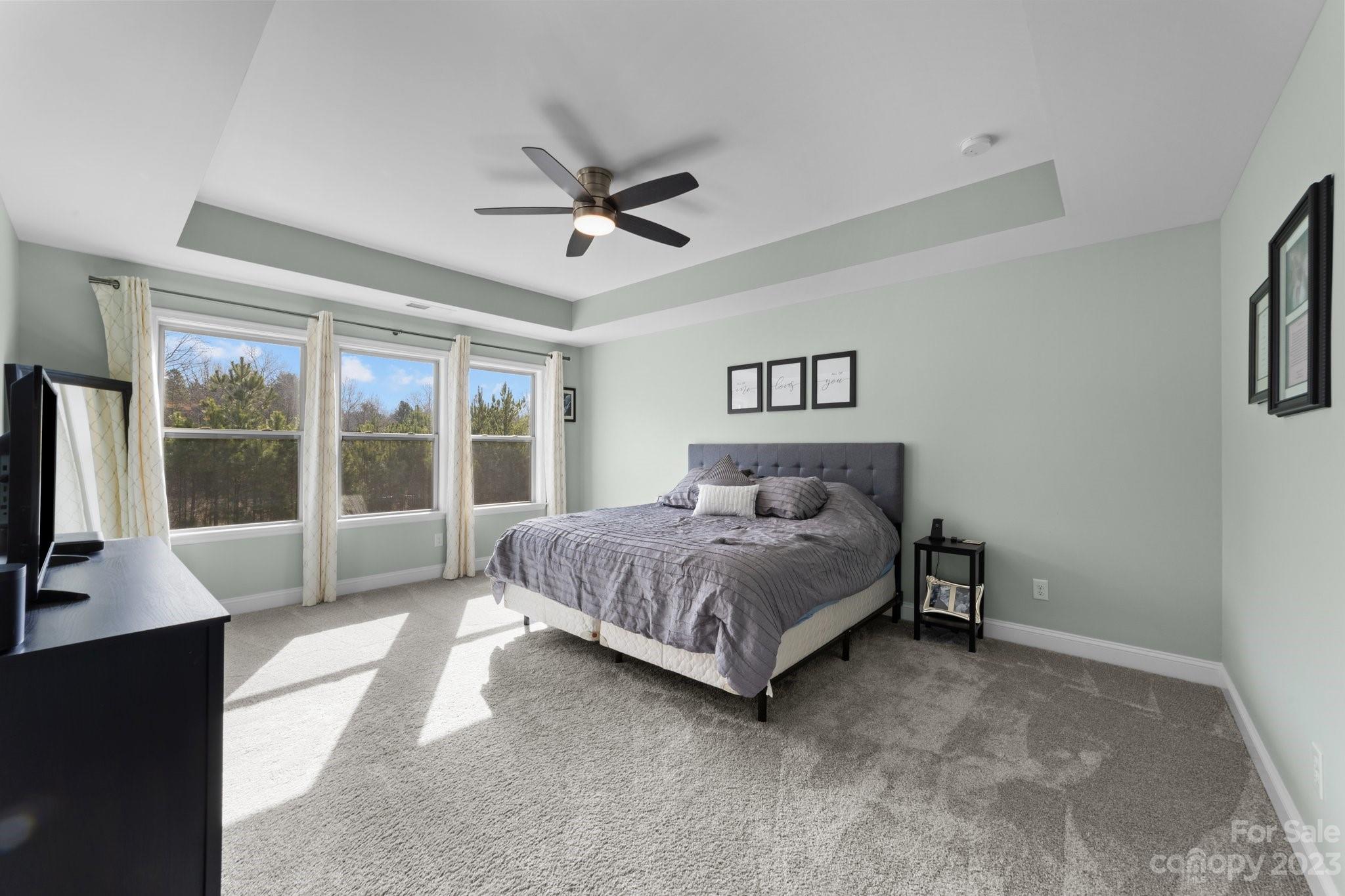 2041 Suttonview Road Fort Mill, SC 29708 - Photo 15 of 27 a spacious bedroom with a bed and a large window