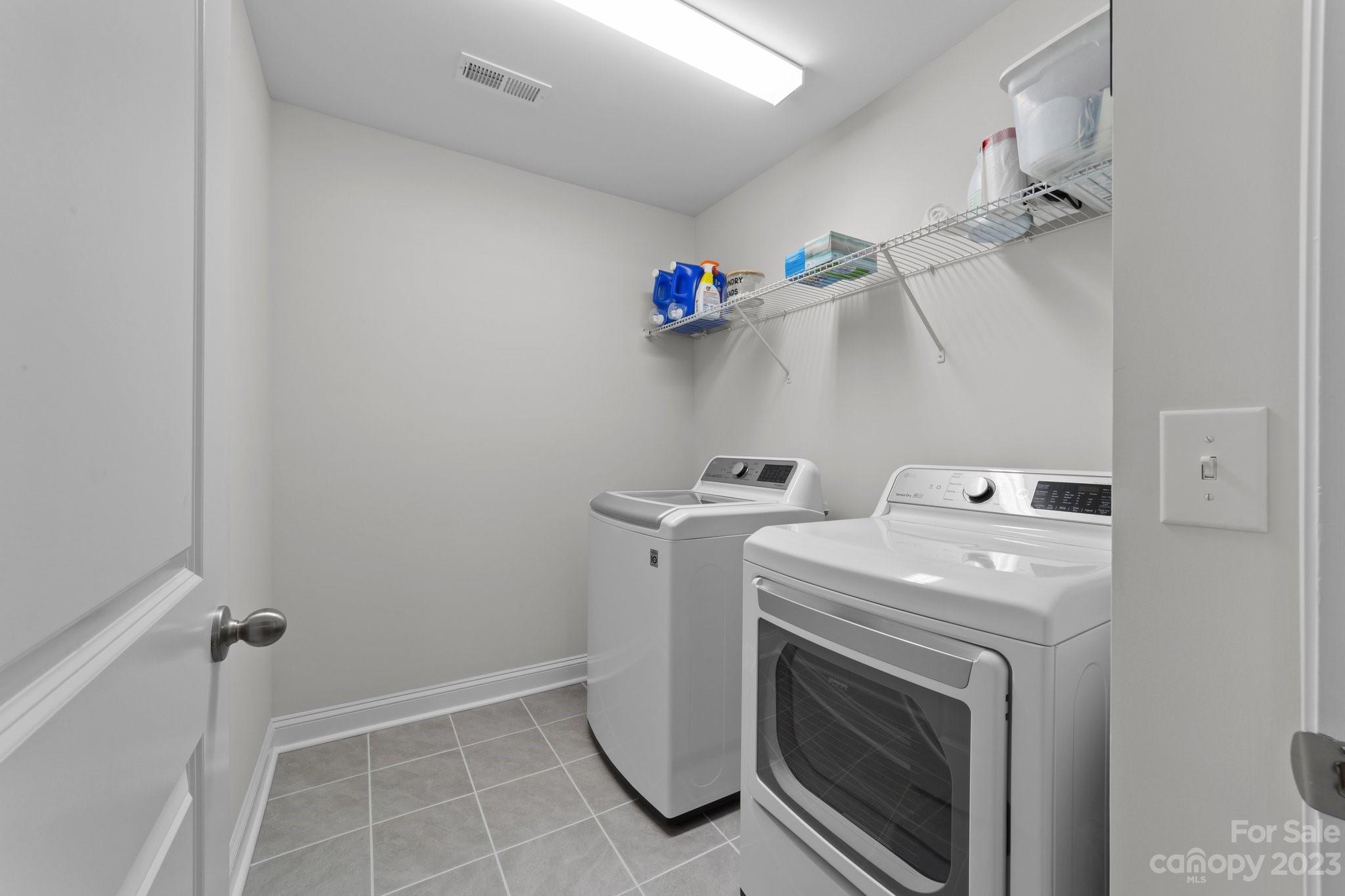 2041 Suttonview Road Fort Mill, SC 29708 - Photo 18 of 27 a utility room with dryer and washer