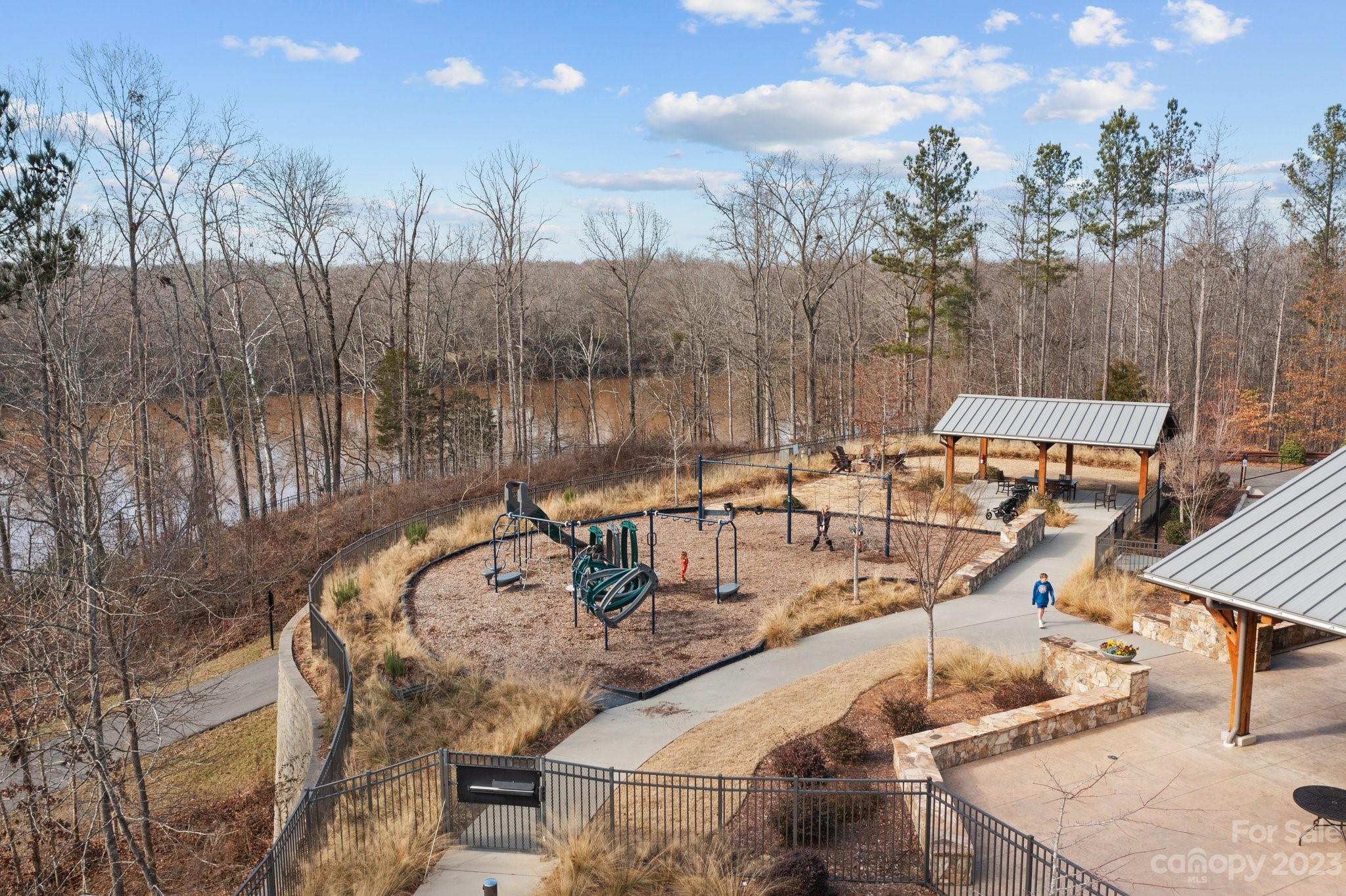 2041 Suttonview Road Fort Mill, SC 29708 - Photo 26 of 27 a backyard of a house with table and chairs