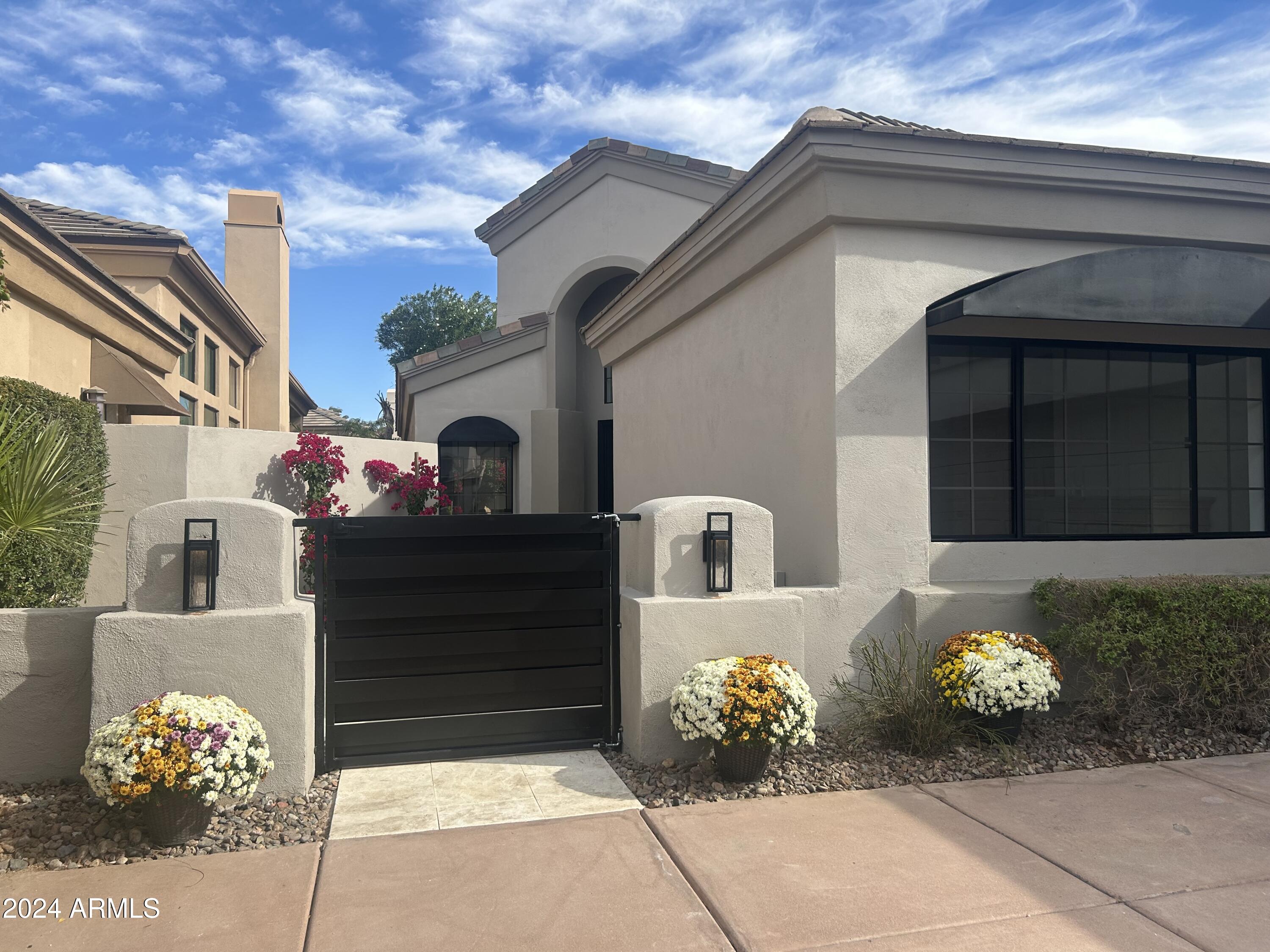 7705 East Doubletree Ranch Road, Unit 46 Scottsdale, AZ 85258 - Photo 2 of 52 ENTRY TO PRIVATE COURTYARD