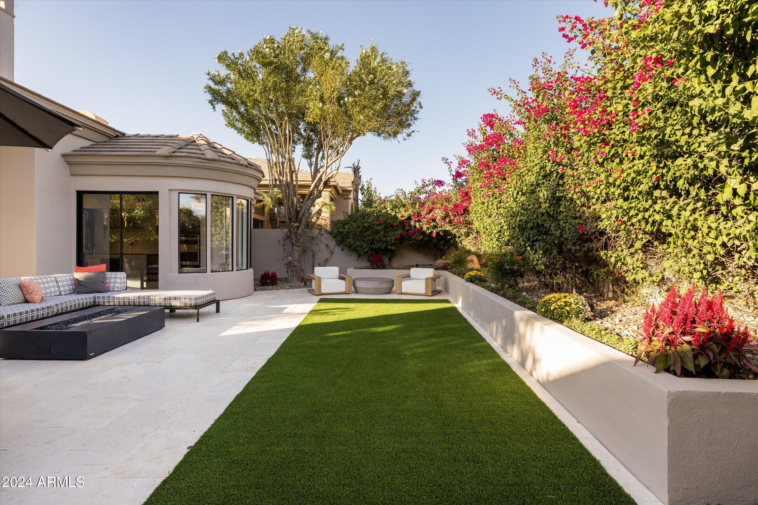7705 East Doubletree Ranch Road, Unit 46 Scottsdale, AZ 85258 - Photo 33 of 52 PROFESSIONALLY DESIGNED BACK YARD