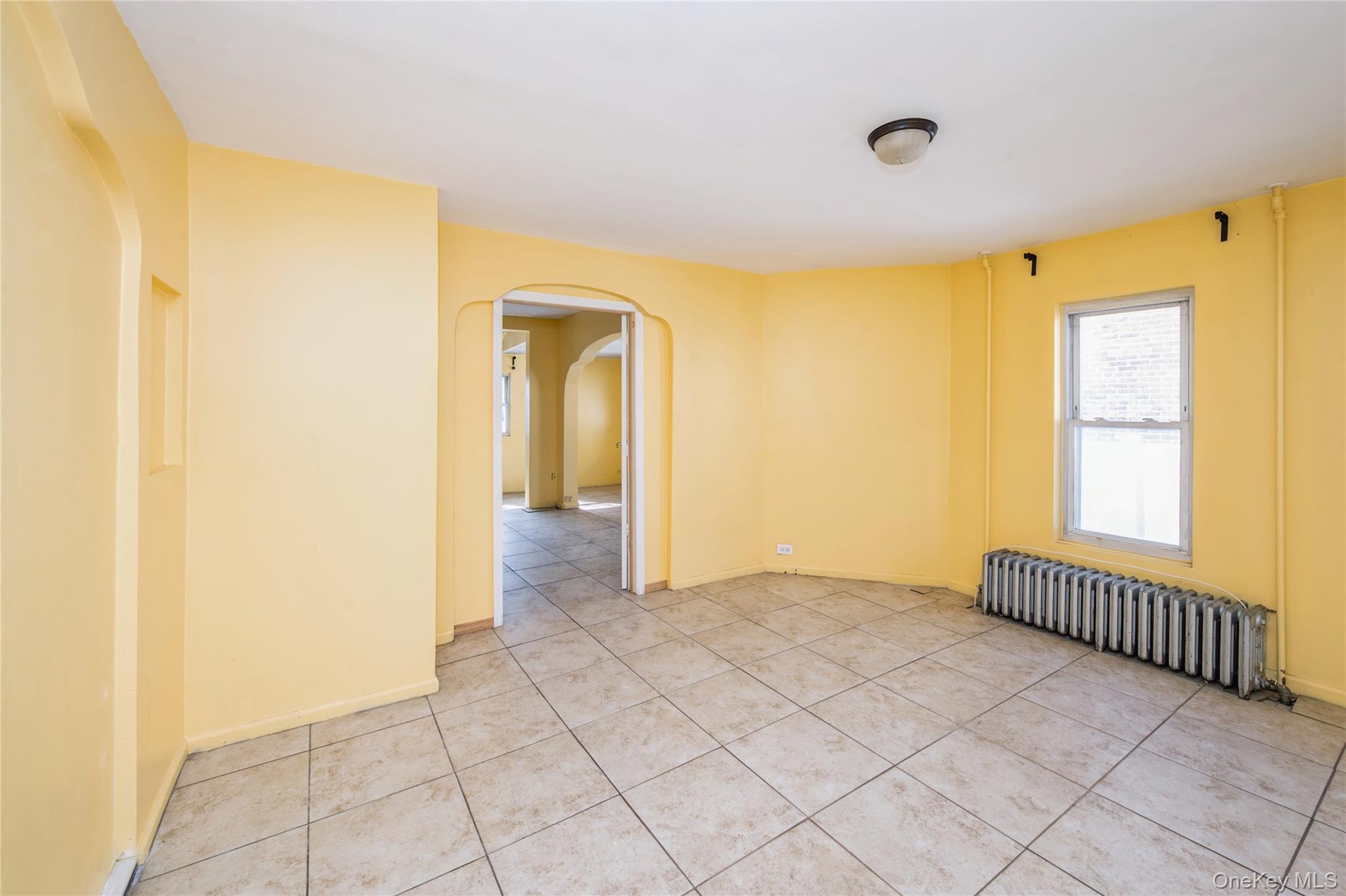 5 Church Street Baldwin, NY 11510 - Photo 11 of 32 a view of an empty room and window