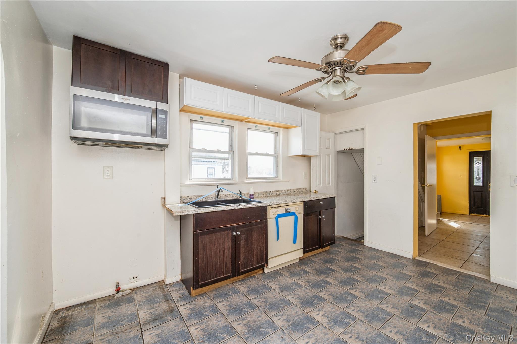 5 Church Street Baldwin, NY 11510 - Photo 13 of 32 a view of a kitchen with a sink and cabinet