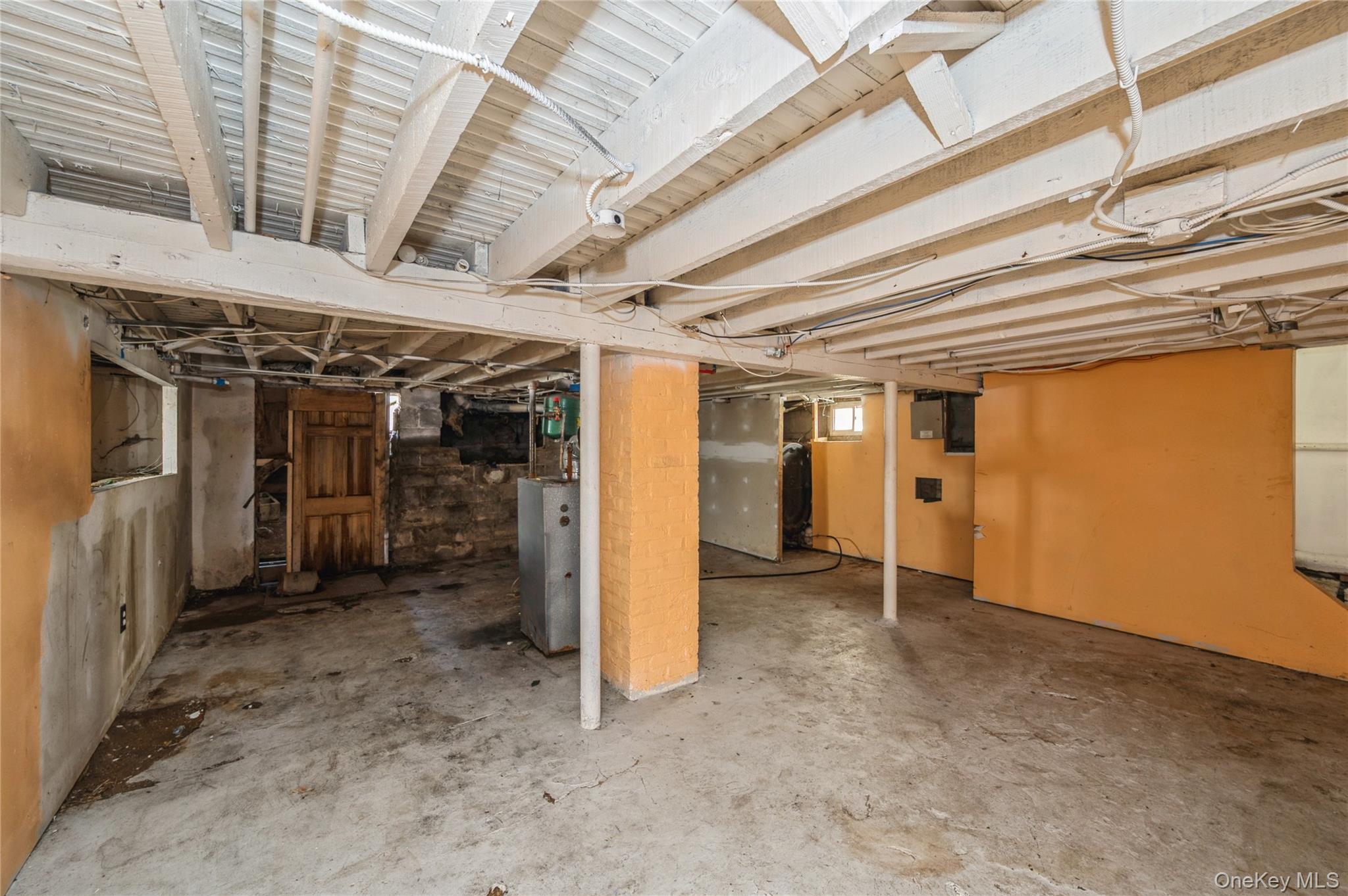 5 Church Street Baldwin, NY 11510 - Photo 28 of 32 a view of a room with wooden walls