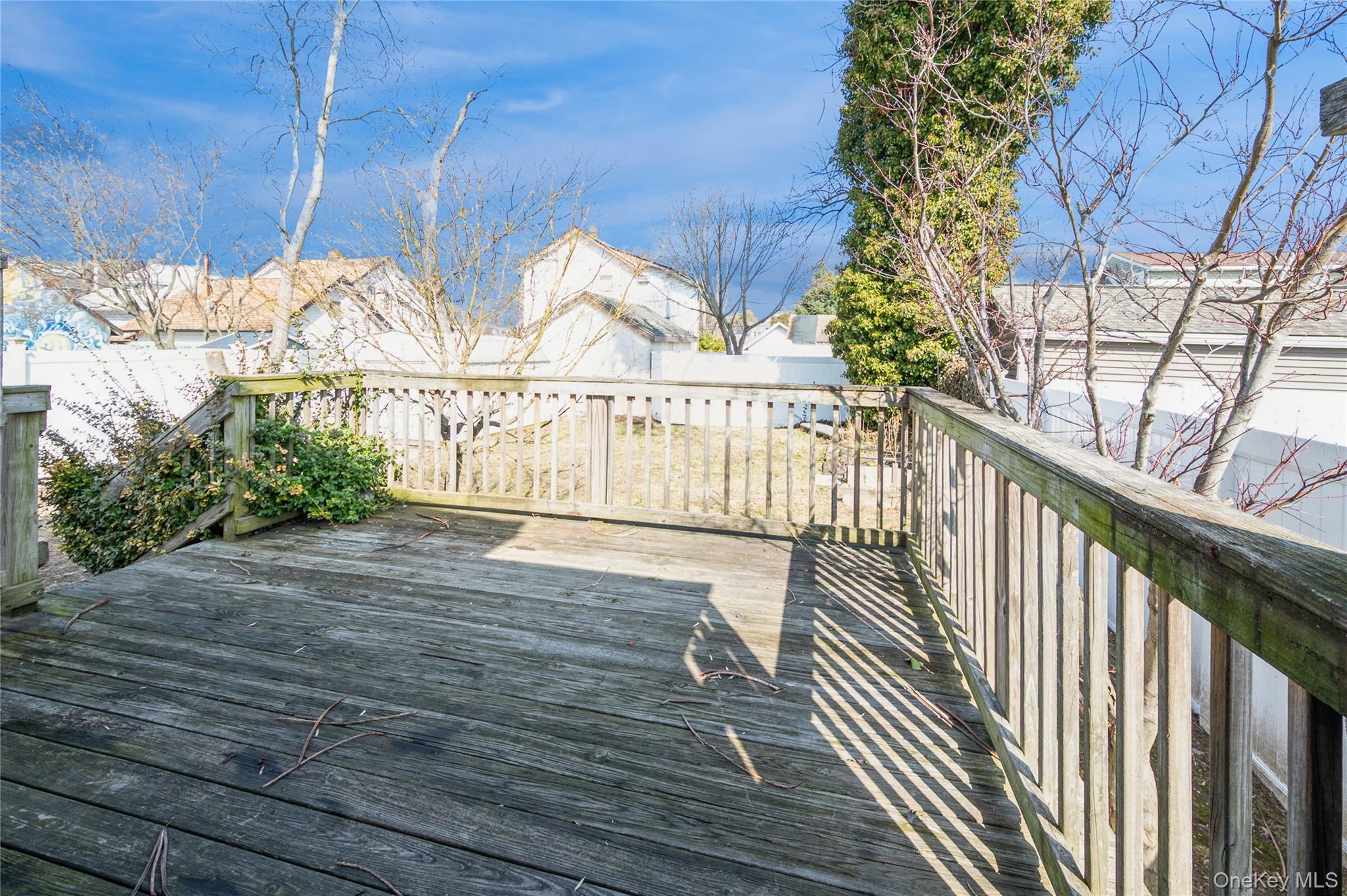 5 Church Street Baldwin, NY 11510 - Photo 30 of 32 a view of balcony with wooden floor