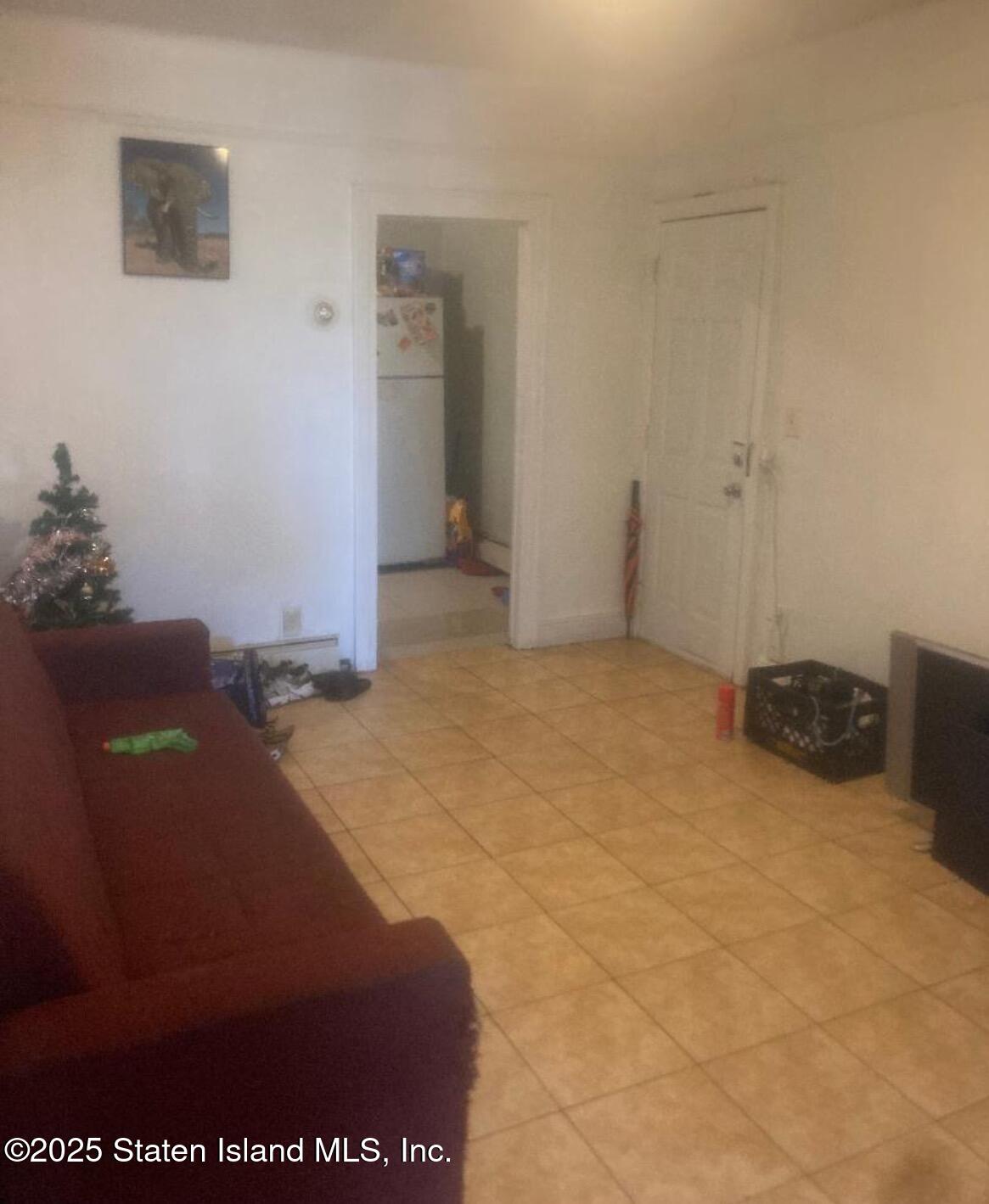 112-09 Francis Lewis Boulevard Queens, NY 11429 - Photo 2 of 3 a view of empty room