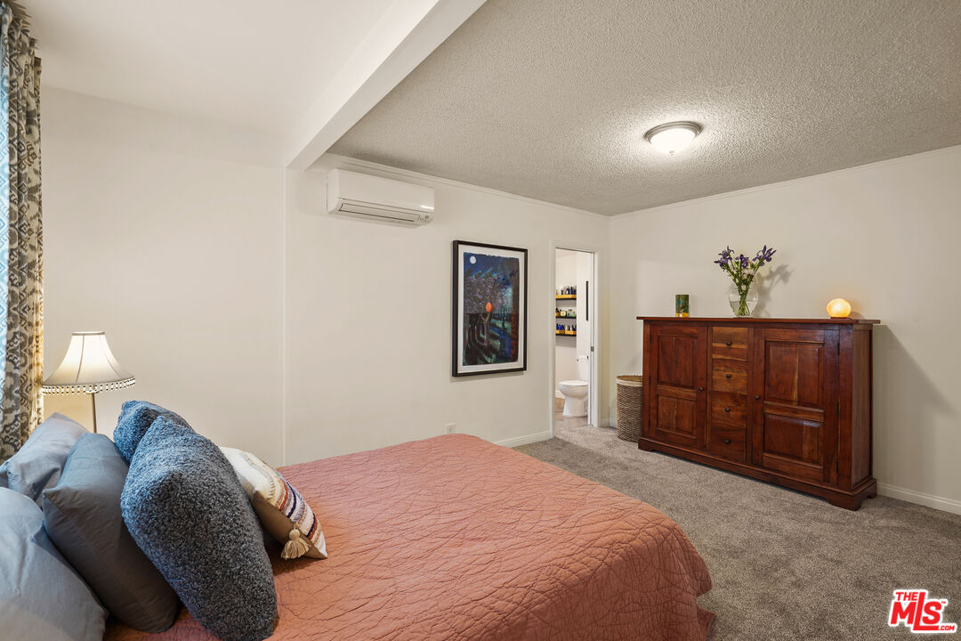 511 Crosby Street Altadena, CA 91001 - Photo 17 of 38 a bedroom with a bed and a dresser