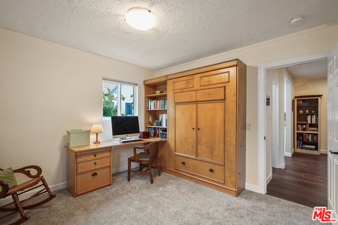 511 Crosby Street Altadena, CA 91001 - Photo 24 of 38 a view of a workspace with furniture and a window