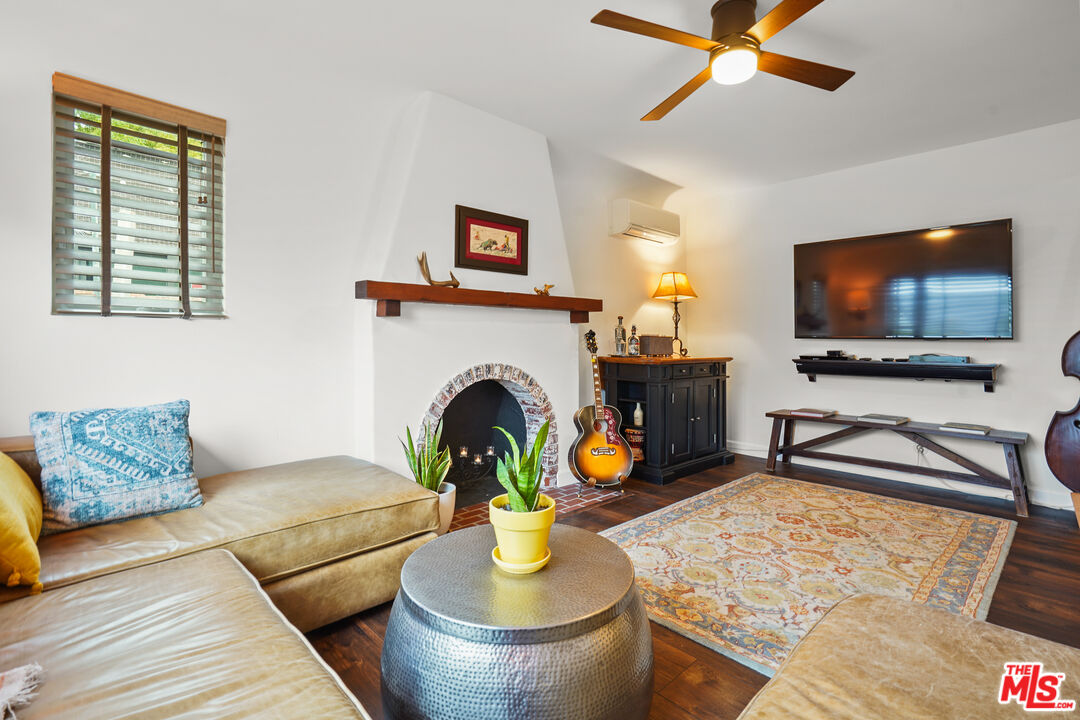 511 Crosby Street Altadena, CA 91001 - Photo 7 of 38 a living room with furniture and a flat screen tv