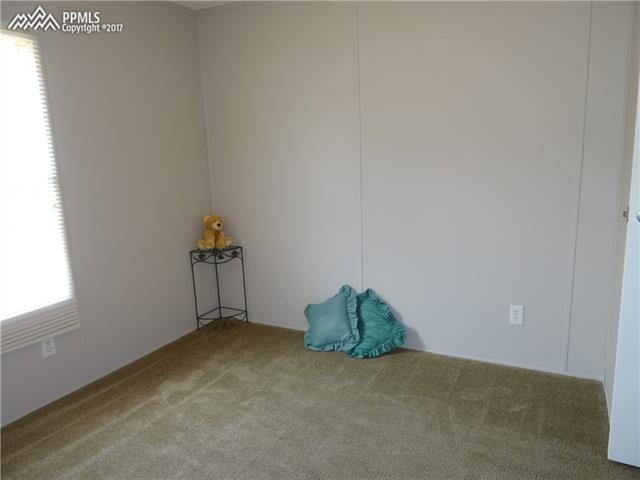 3405 Sinton Road, Unit 233 Colorado Springs, CO 80907 - Photo 16 of 22 Second bedroom