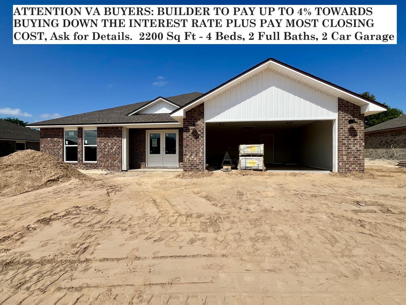 a view of a house with a snow in the yard