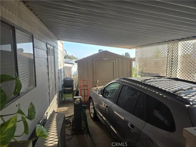 a view of a street with a building in the background